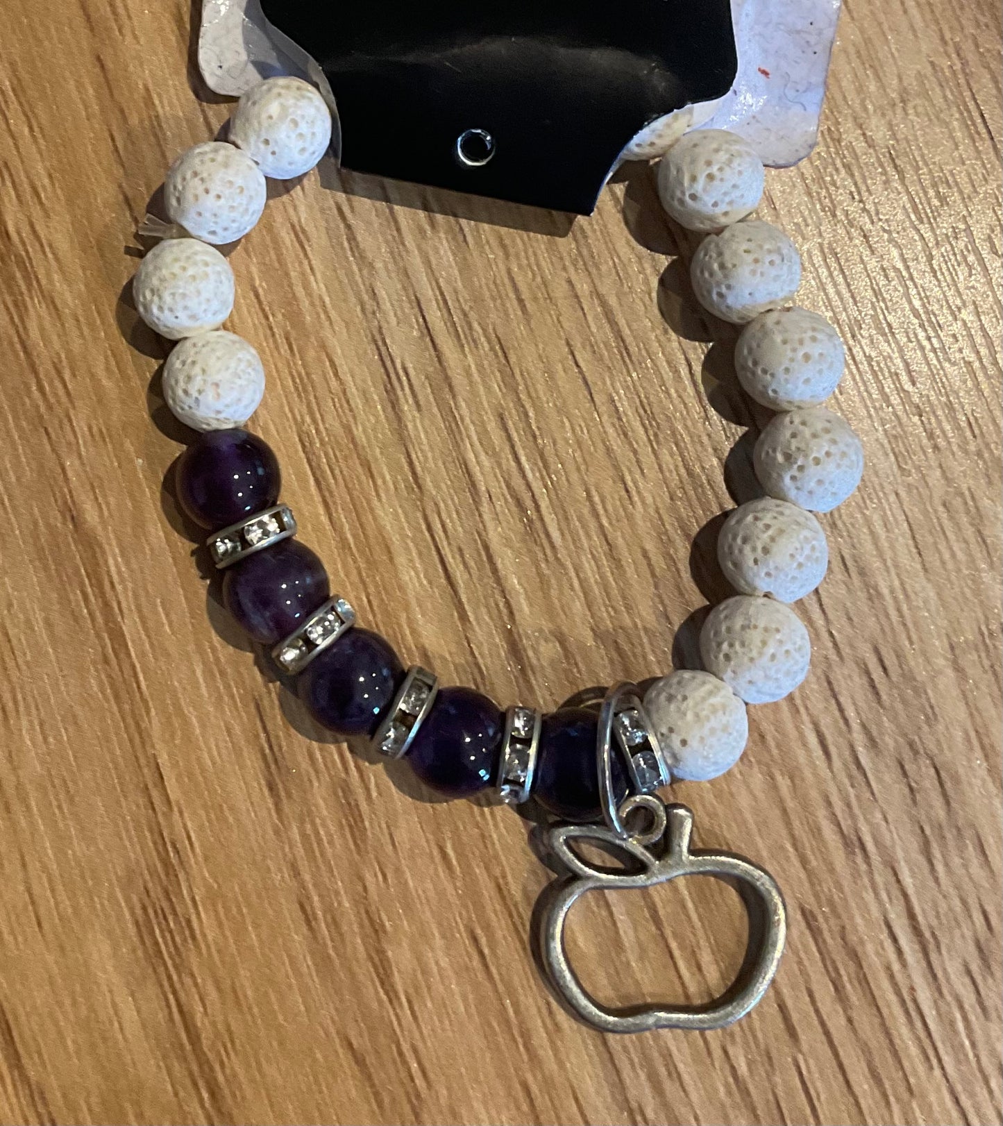 *Bracelet White Lava Beads and Charm