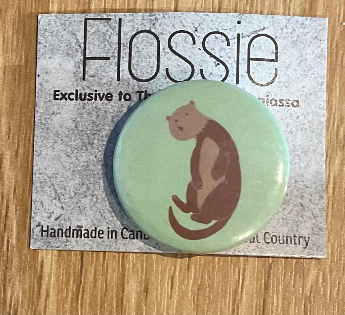*Badge Otter