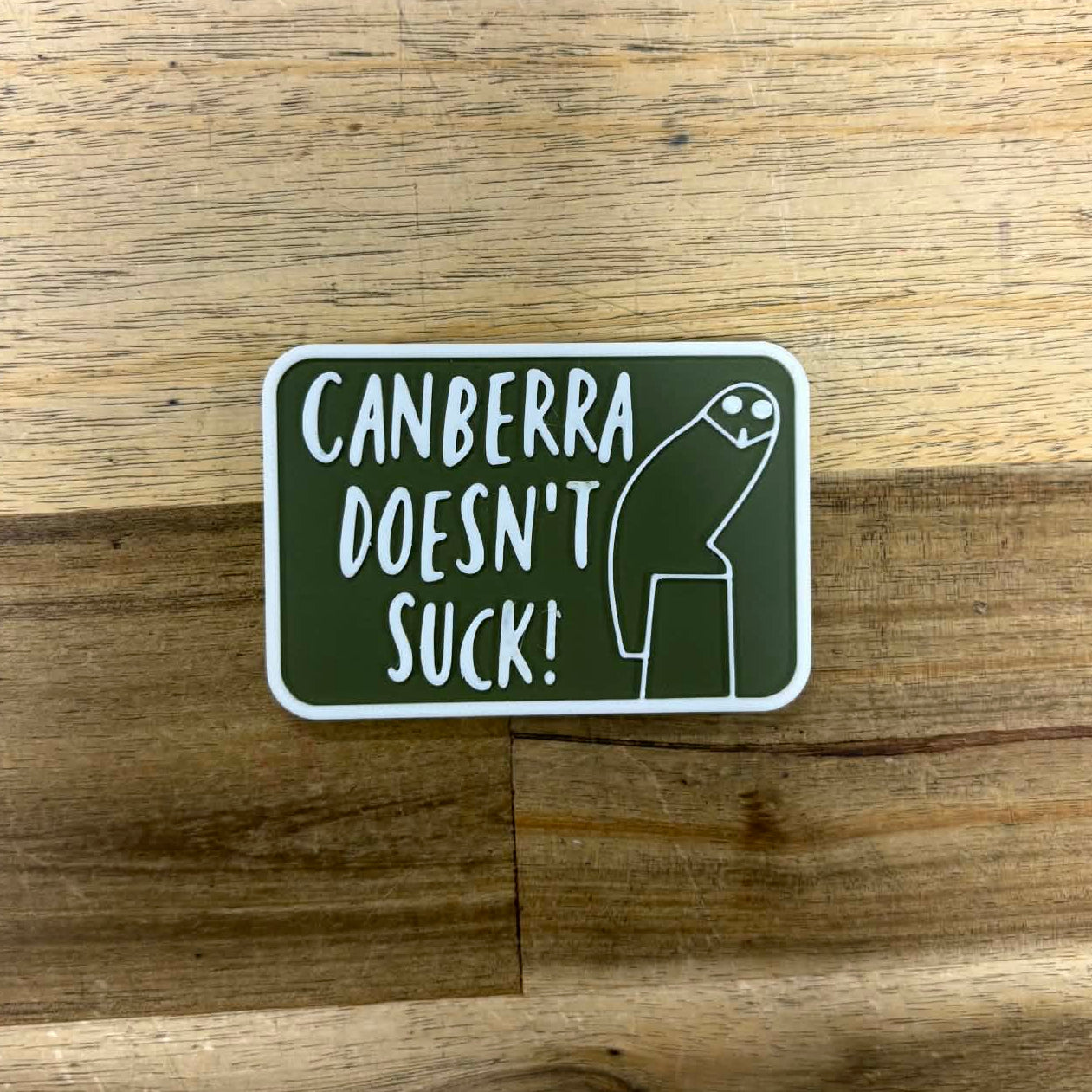 Canberra Doesn't Suck Magnet - Green