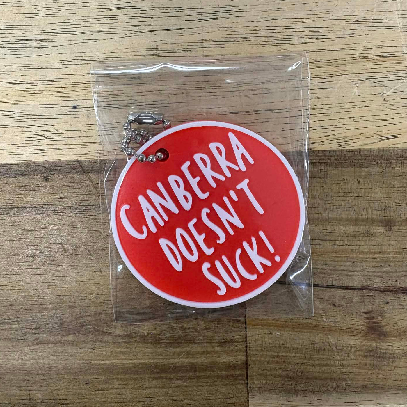 Canberra Doesn't Suck Keyring - Red